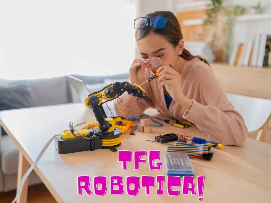 Estudiante ensamblando y programando un brazo robótico para un TFG de robótica